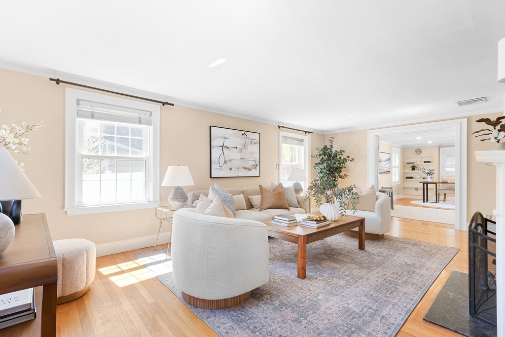 587 Greendale Avenue Needham, MA 02492 - Photo 10 of 36 a living room with furniture and wooden floor