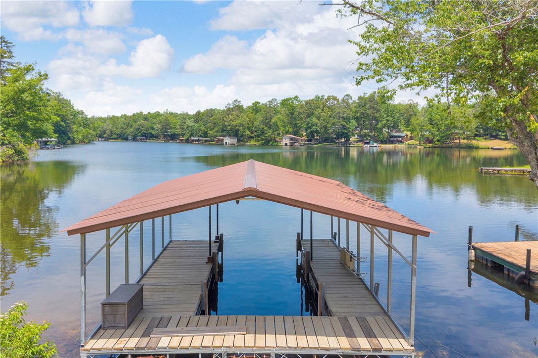 334 Lake Becky Road Mountain Rest, SC 29664 - Photo 36 of 46 A private boat dock provides direct lake access and scenic views of the wooded shoreline.
