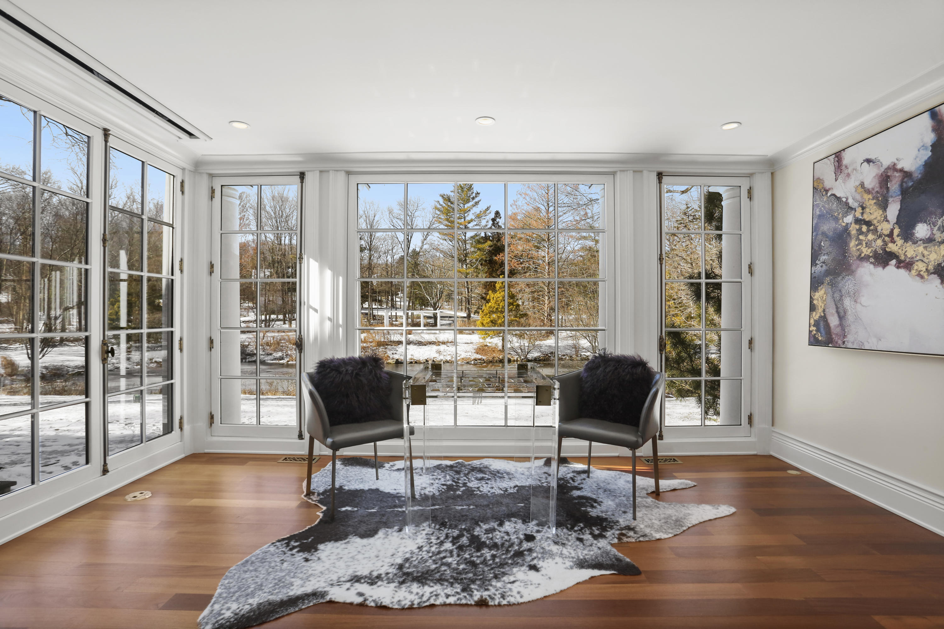 89 Dabney Road New Canaan, CT 06840 - Photo 12 of 40 a living room with furniture and a large window
