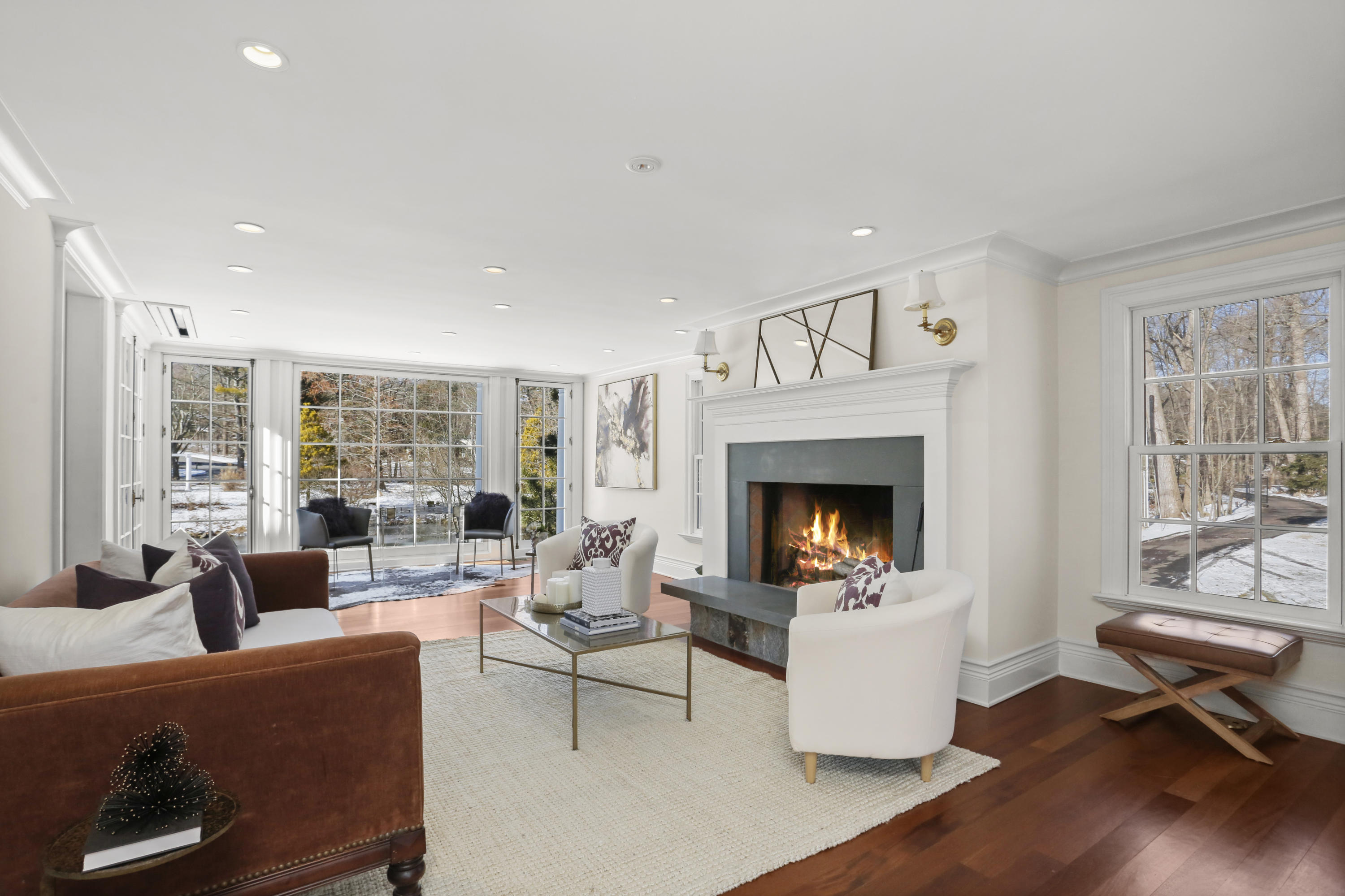 89 Dabney Road New Canaan, CT 06840 - Photo 15 of 40 a living room with furniture fireplace and window