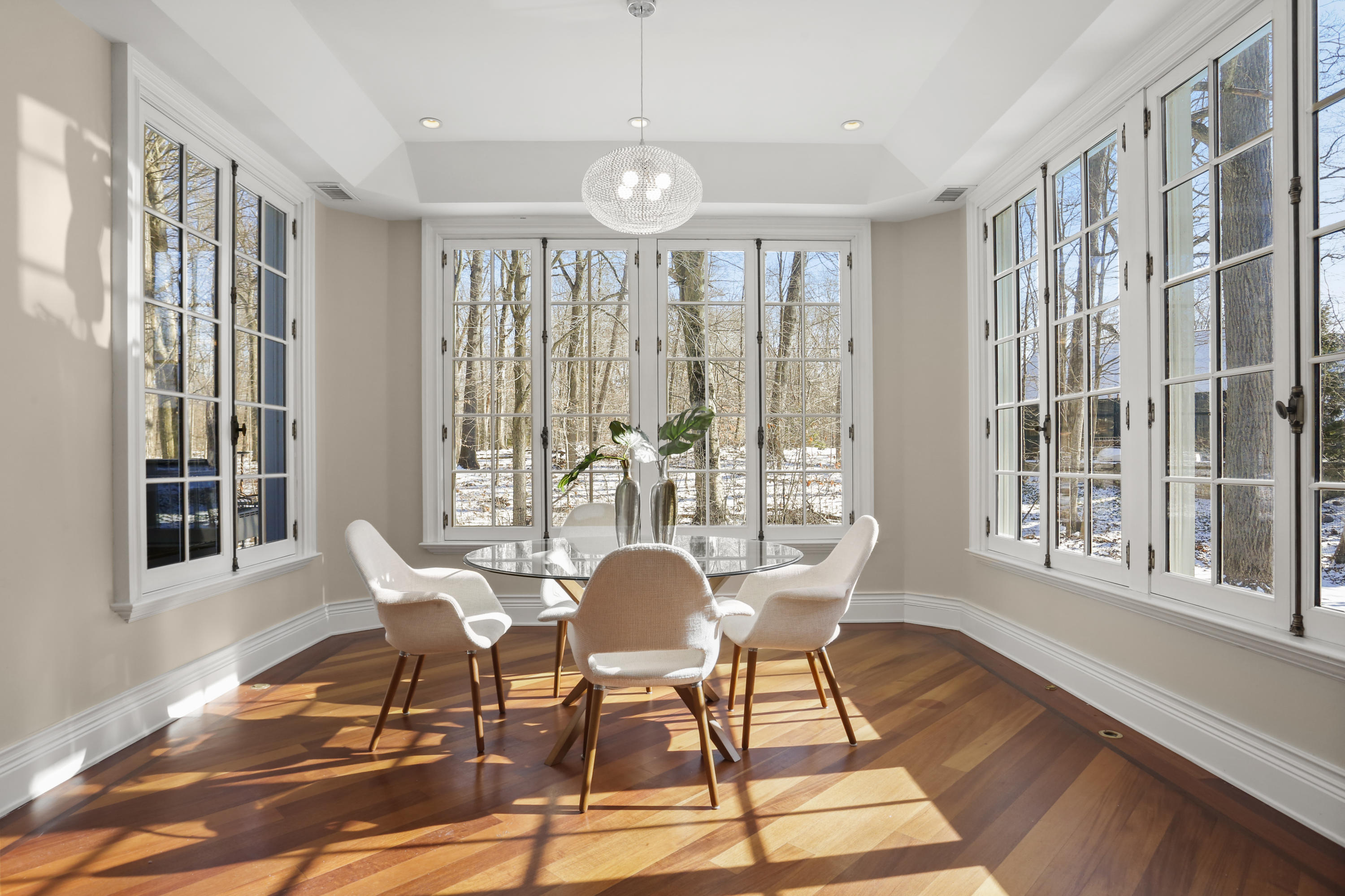 89 Dabney Road New Canaan, CT 06840 - Photo 21 of 40 a view of a dining room with furniture window and wooden floor