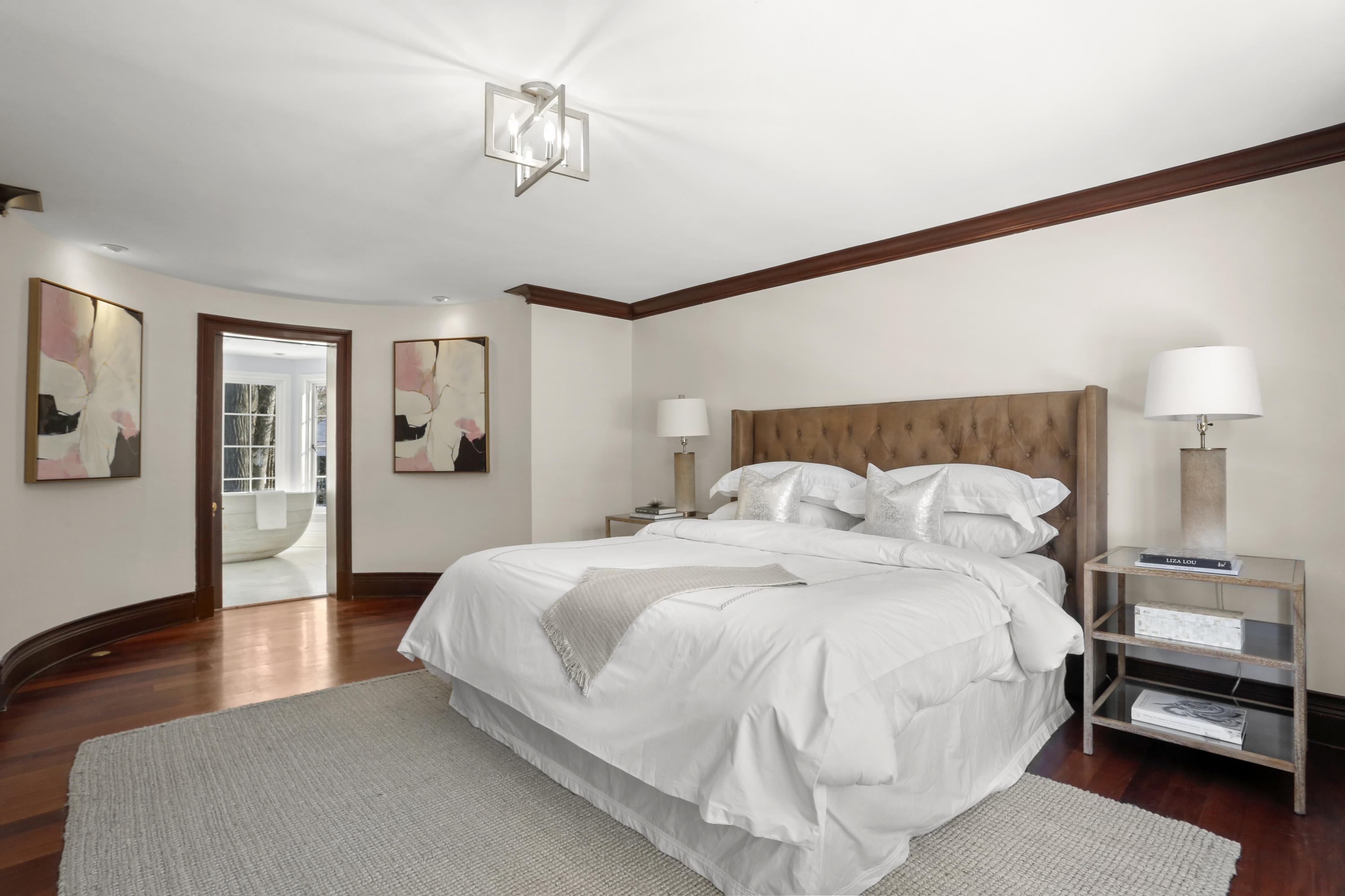 89 Dabney Road New Canaan, CT 06840 - Photo 27 of 40 a bedroom with a bed and wooden floor