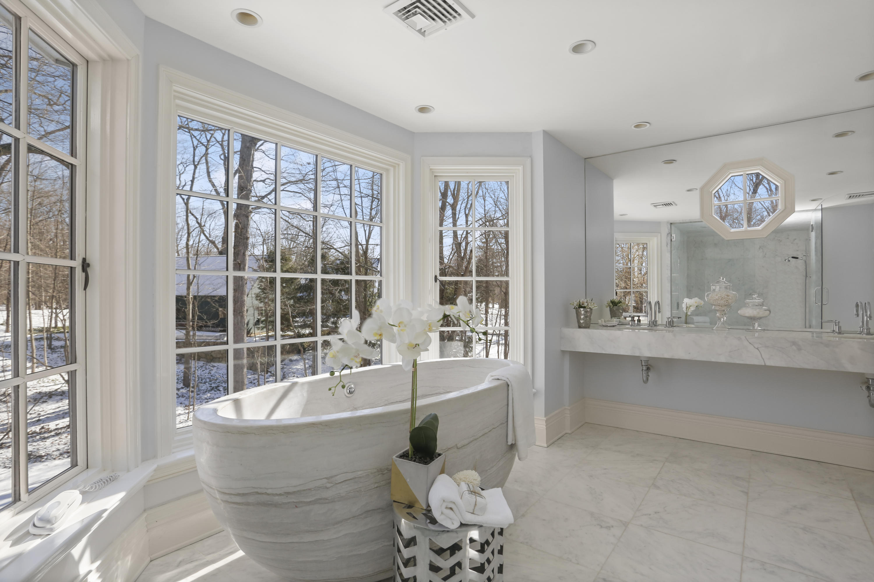 89 Dabney Road New Canaan, CT 06840 - Photo 28 of 40 a bathroom with bathtub and large window