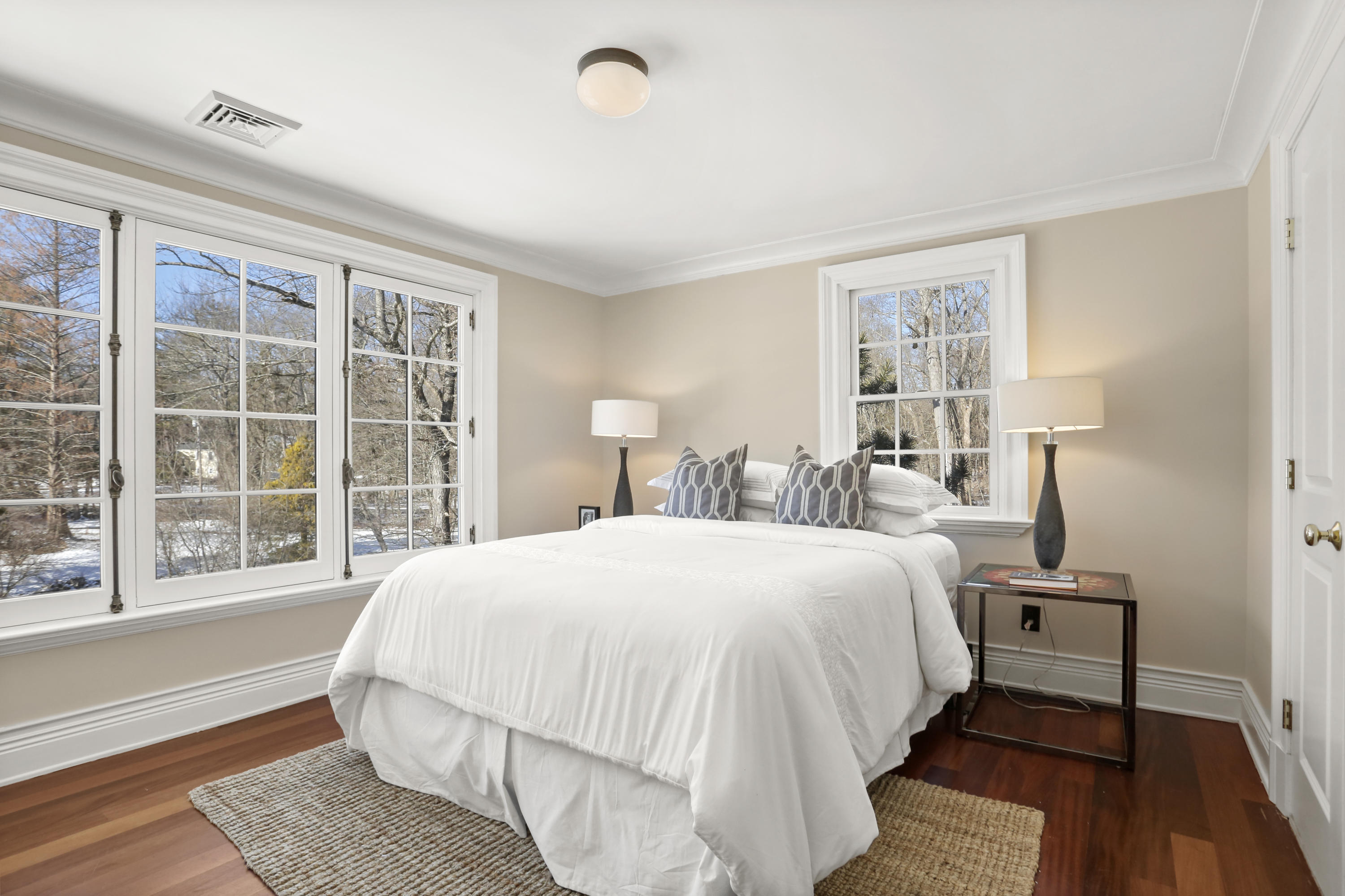 89 Dabney Road New Canaan, CT 06840 - Photo 31 of 40 a bedroom with a large bed and a window