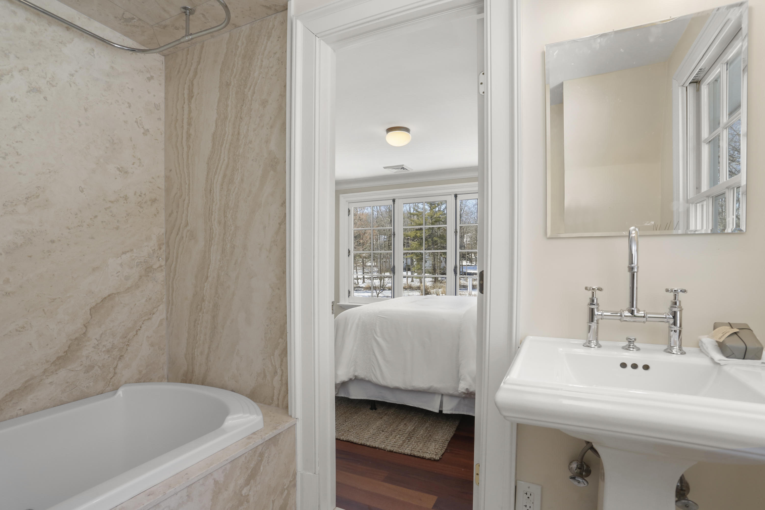 89 Dabney Road New Canaan, CT 06840 - Photo 32 of 40 a bathroom with a sink and a bathtub
