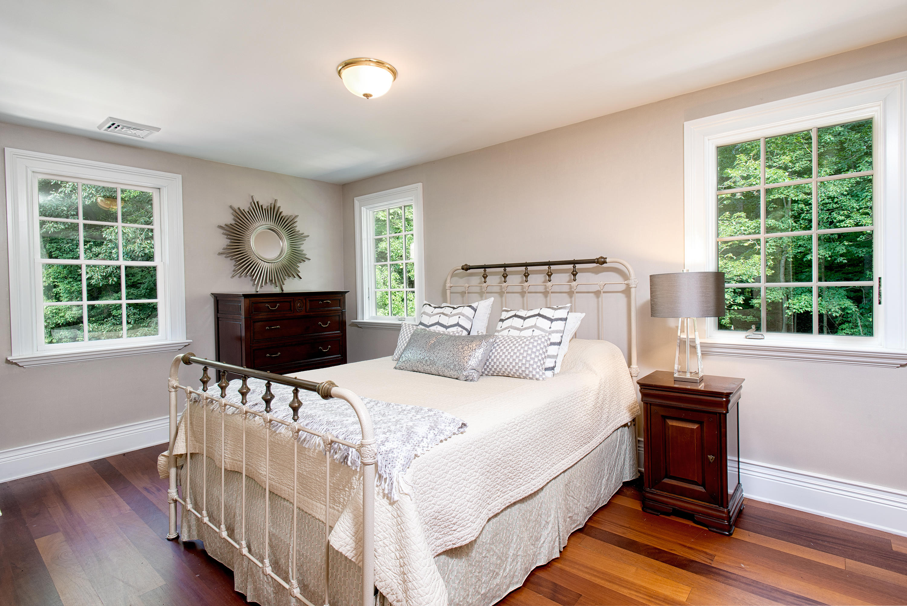 89 Dabney Road New Canaan, CT 06840 - Photo 33 of 40 a bedroom with a bed and a flat screen tv