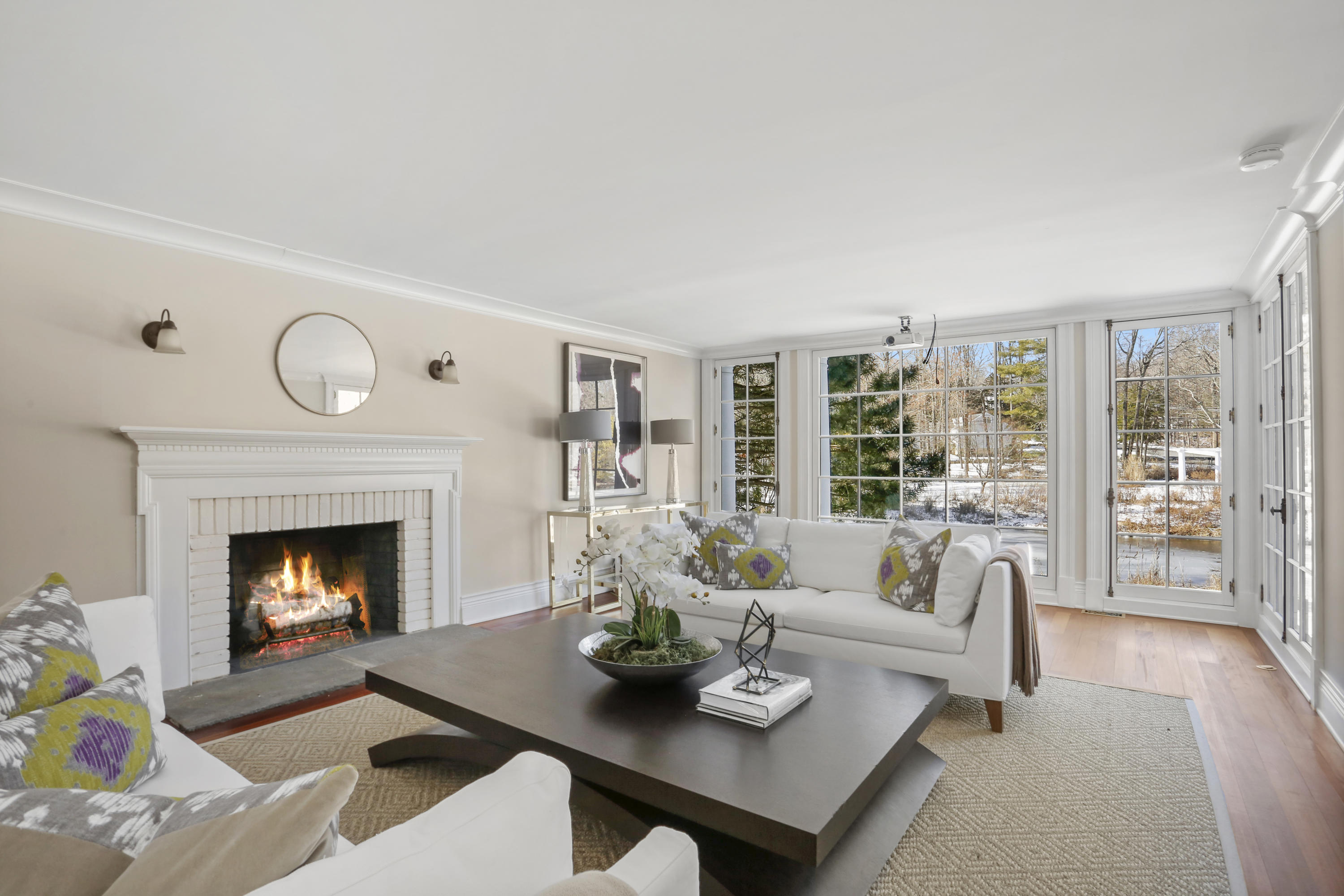 89 Dabney Road New Canaan, CT 06840 - Photo 7 of 40 a living room with furniture and a fireplace