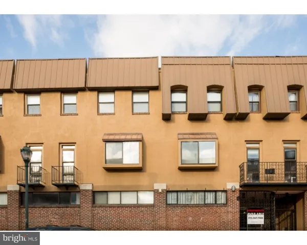 a black and white wall with black and white cabinet