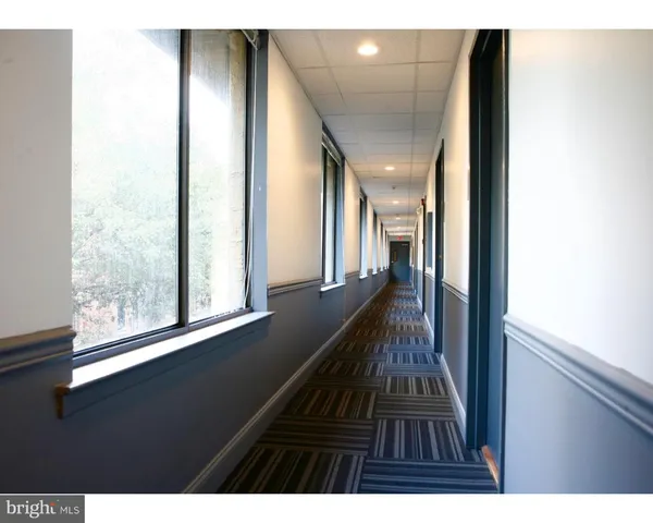 a view of balcony with wooden floor