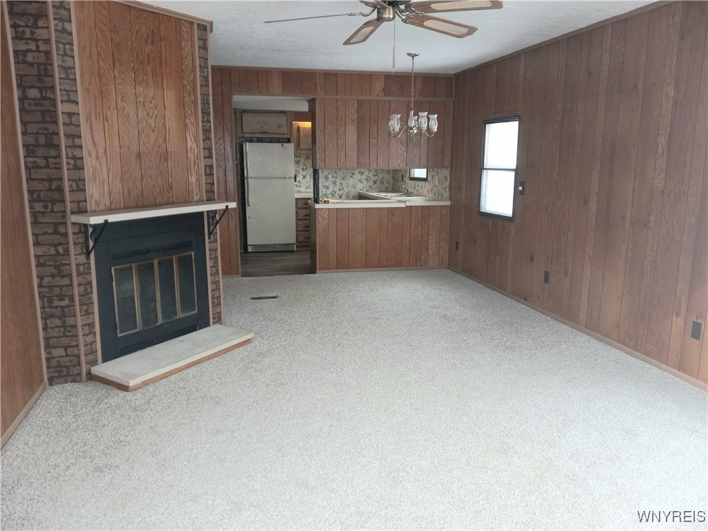 1033 Wish Circle Marilla, NY 14052 - Photo 4 of 12 Living Room to Kitchen