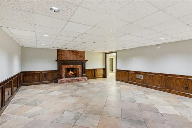 a view of a large kitchen with a large window