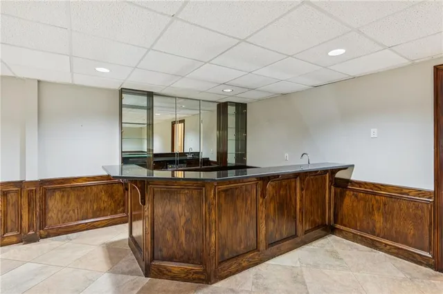 a view of an empty room with a bathroom