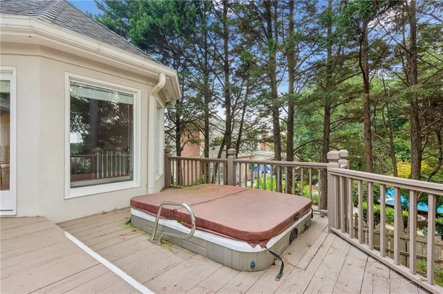 a view of a yard with a house in the background