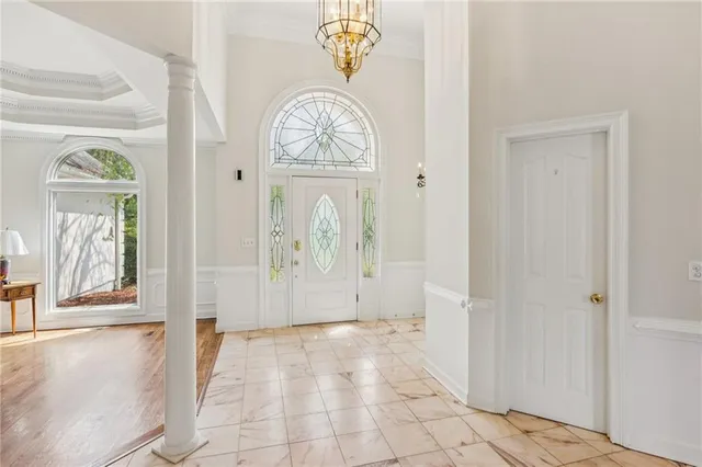 a view of a entryway door with wooden floor