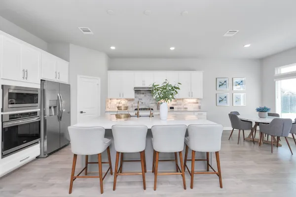 a view of a dining room with furniture