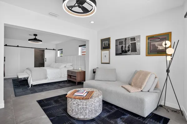 a living room with furniture and a couch