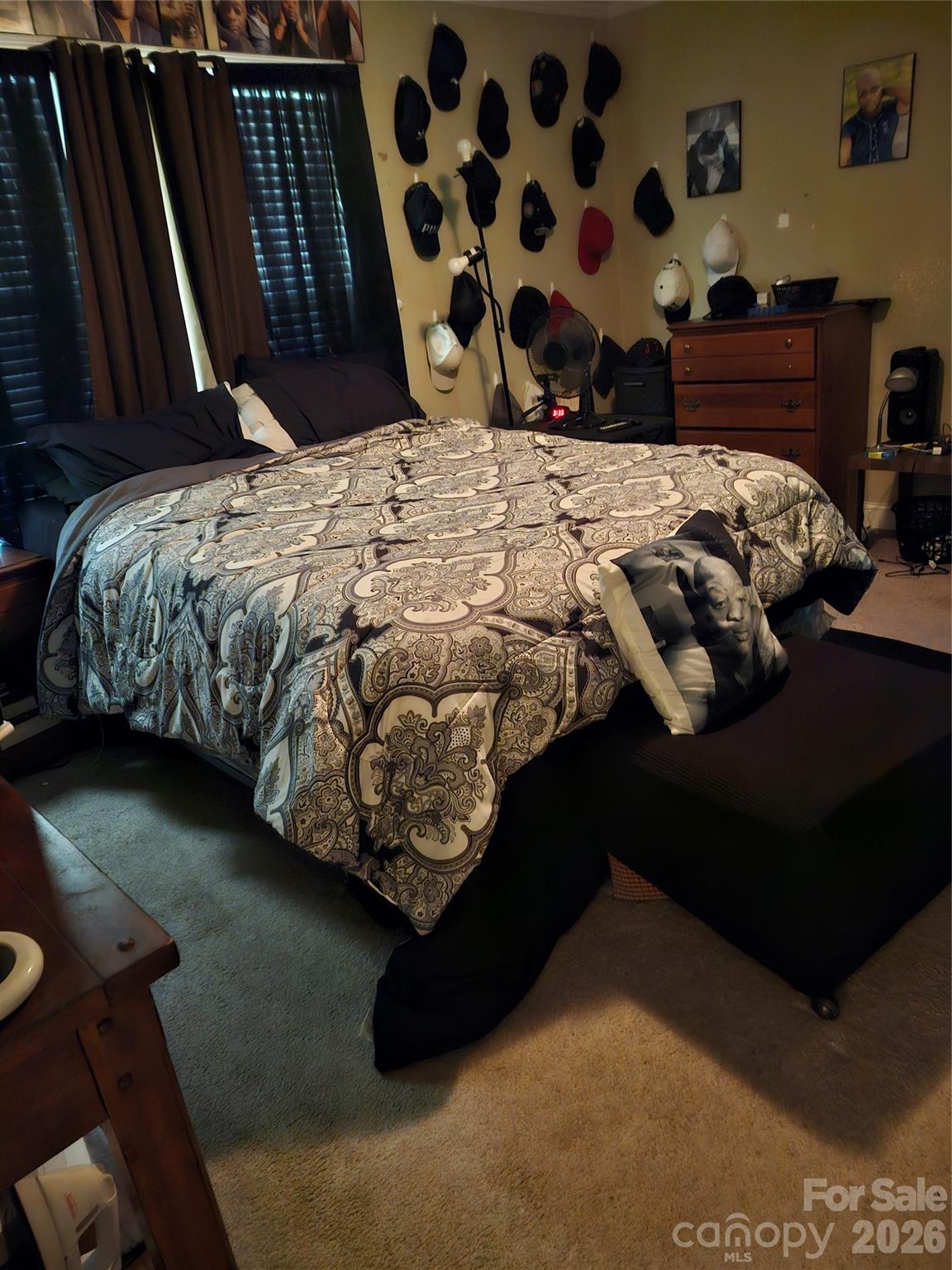 213 Vicki Way Stanley, NC 28164 - Photo 14 of 19 a bed sitting in a bedroom next to a window