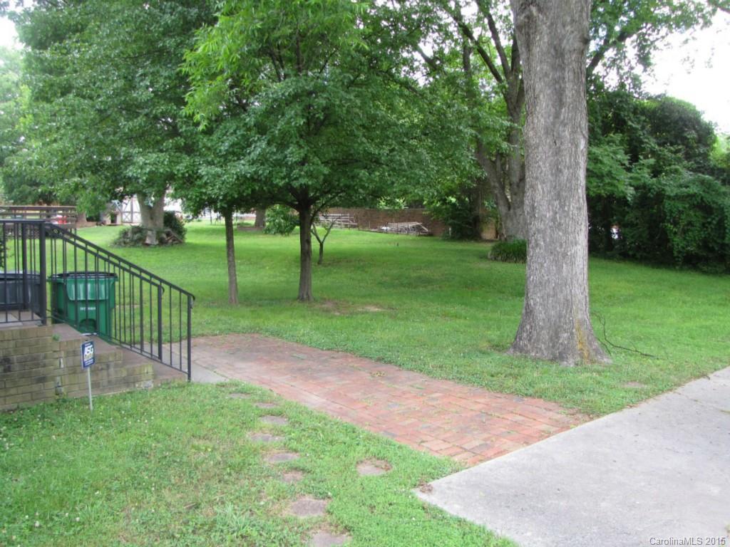 6133 Williams Road Charlotte, NC 28215 - Photo 14 of 14 a view of a park with large trees