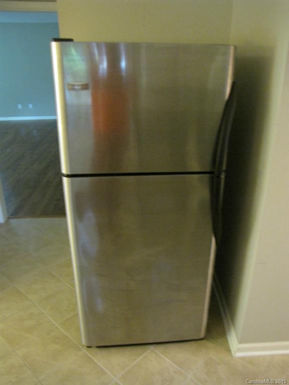 6133 Williams Road Charlotte, NC 28215 - Photo 8 of 14 a view of a refrigerator in kitchen