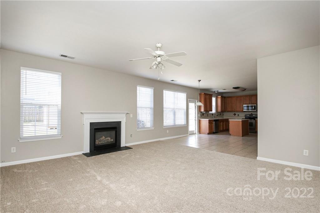 1807 Montague Road, Unit 254 Clover, SC 29710 - Photo 15 of 48 a view of empty room with a fireplace and window