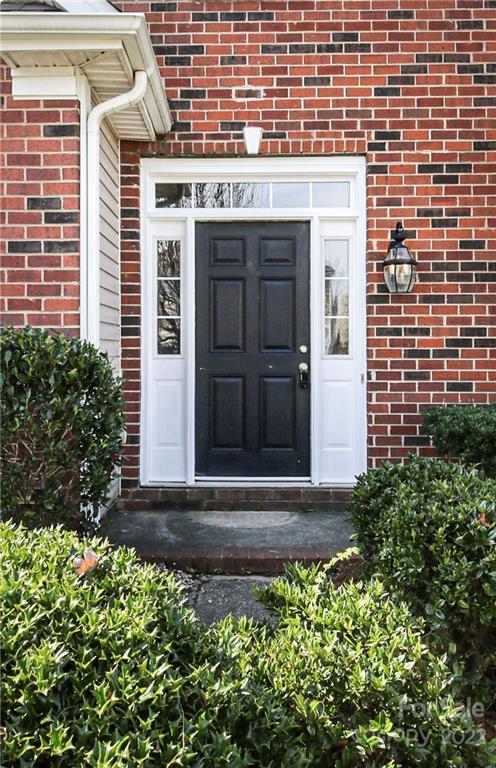 1807 Montague Road, Unit 254 Clover, SC 29710 - Photo 2 of 48 a front view of a house with a garden