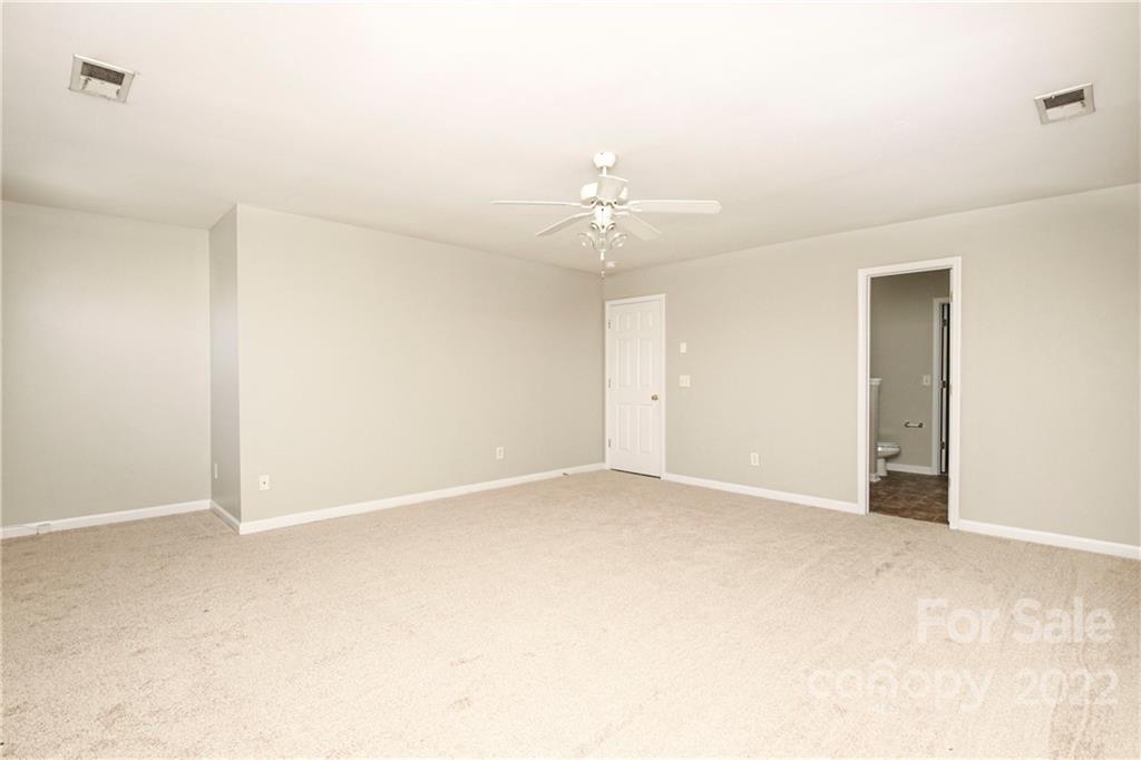 1807 Montague Road, Unit 254 Clover, SC 29710 - Photo 22 of 48 an empty room with chandelier fan