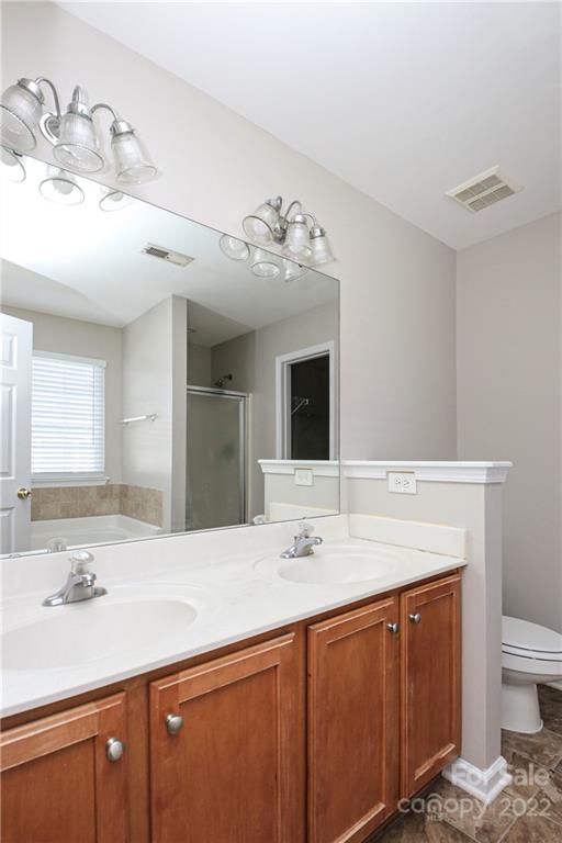 1807 Montague Road, Unit 254 Clover, SC 29710 - Photo 23 of 48 a bathroom with a sink double vanity and a mirror
