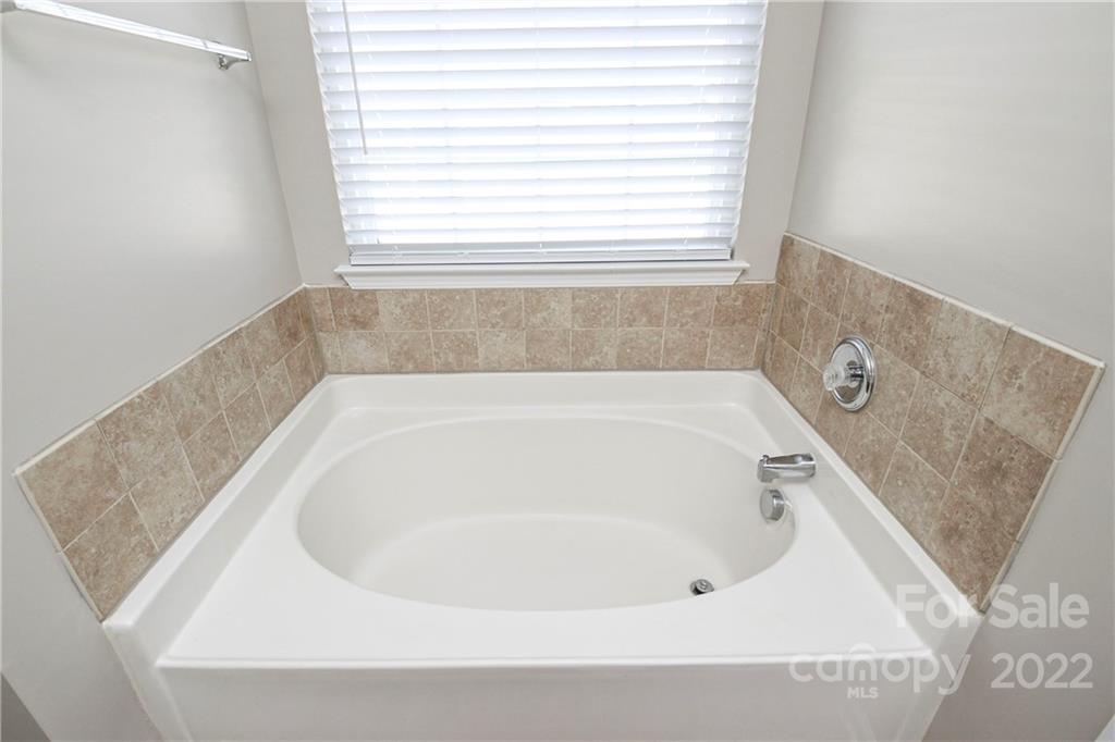1807 Montague Road, Unit 254 Clover, SC 29710 - Photo 27 of 48 a bathroom with a bathtub