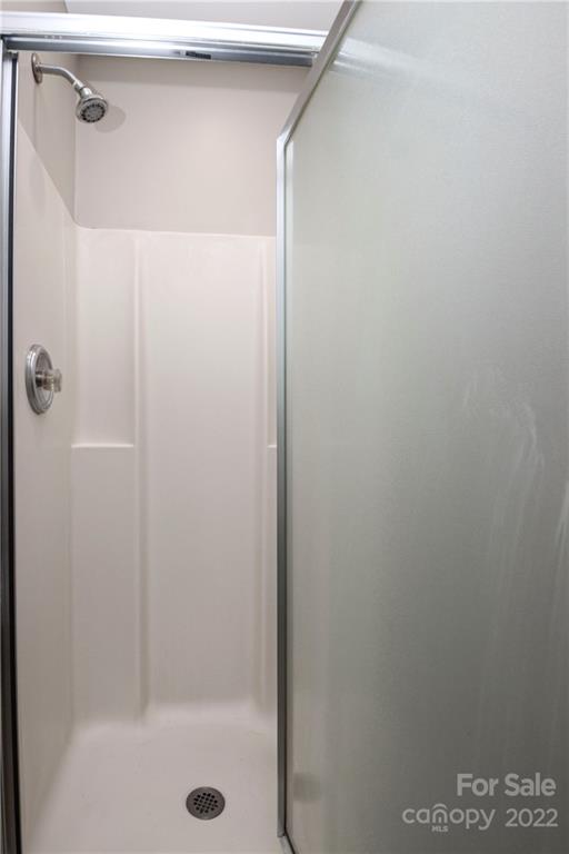 1807 Montague Road, Unit 254 Clover, SC 29710 - Photo 29 of 48 a bathroom with a glass shower door