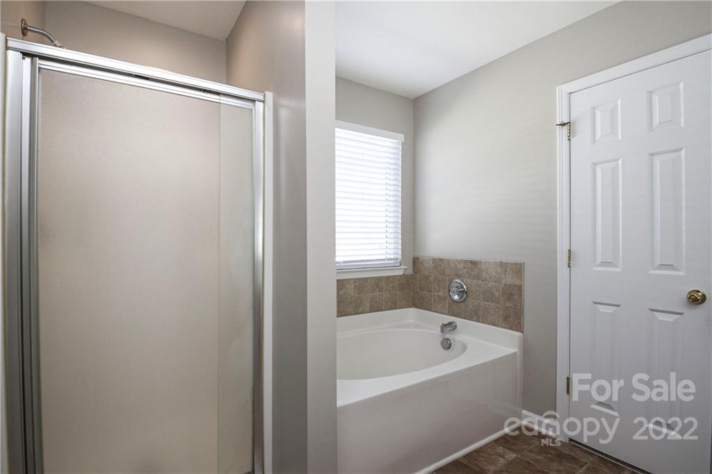 1807 Montague Road, Unit 254 Clover, SC 29710 - Photo 30 of 48 a bathroom with a bathtub and shower