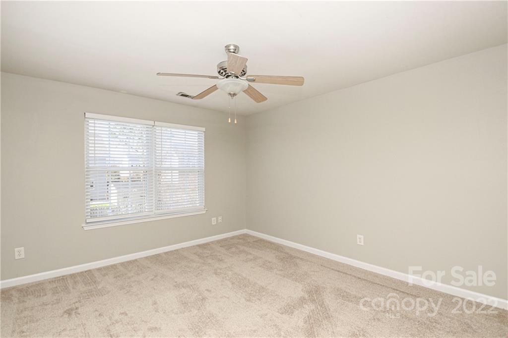 1807 Montague Road, Unit 254 Clover, SC 29710 - Photo 32 of 48 an empty room with windows and fan