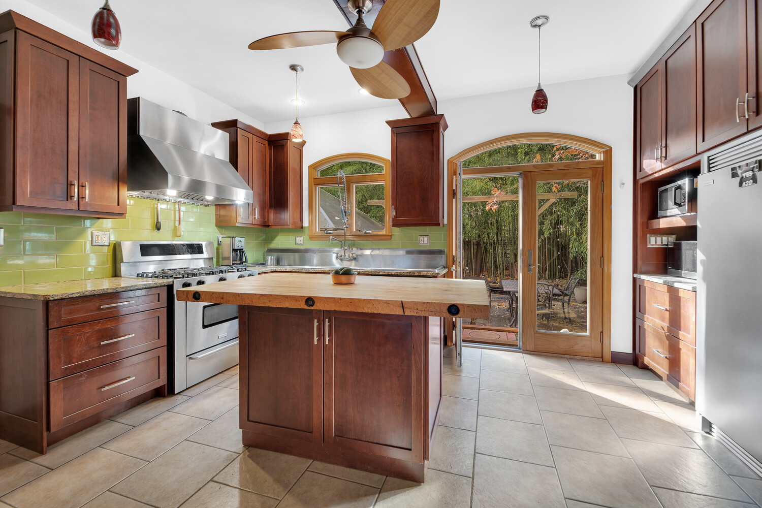 242 Stratford Road Brooklyn, NY 11218 - Photo 5 of 27 a kitchen with a sink cabinets and window