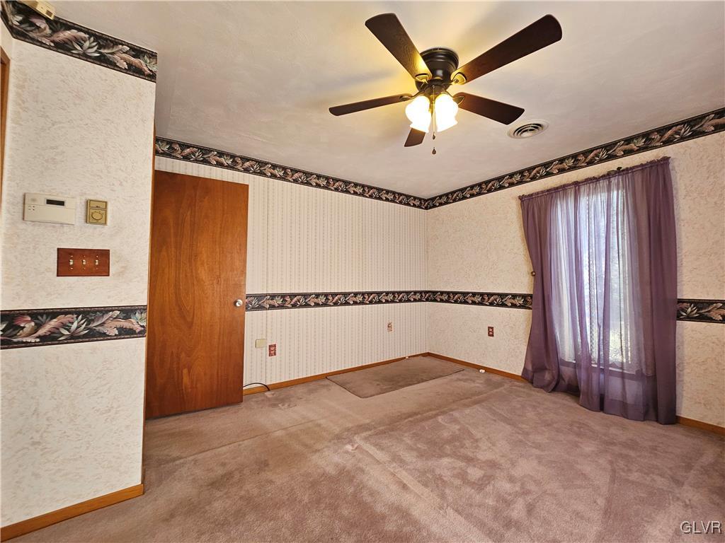 800 Copella Road Bath, PA 18014 - Photo 21 of 43 a view of a livingroom with a ceiling fan & a ceiling fan
