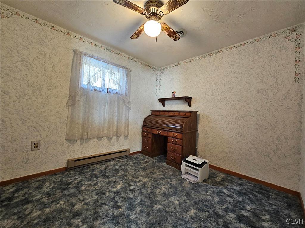 800 Copella Road Bath, PA 18014 - Photo 24 of 43 a room with a piano and wooden floor