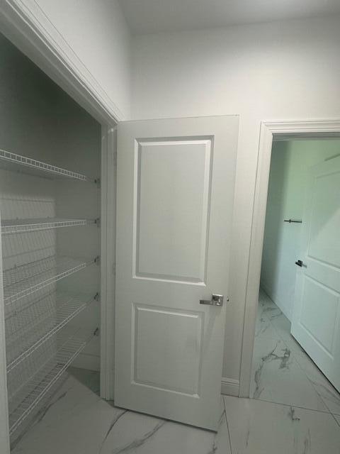 1726 Southwest California Boulevard Port St. Lucie, FL 34953 - Photo 21 of 41 a bathroom with a shower