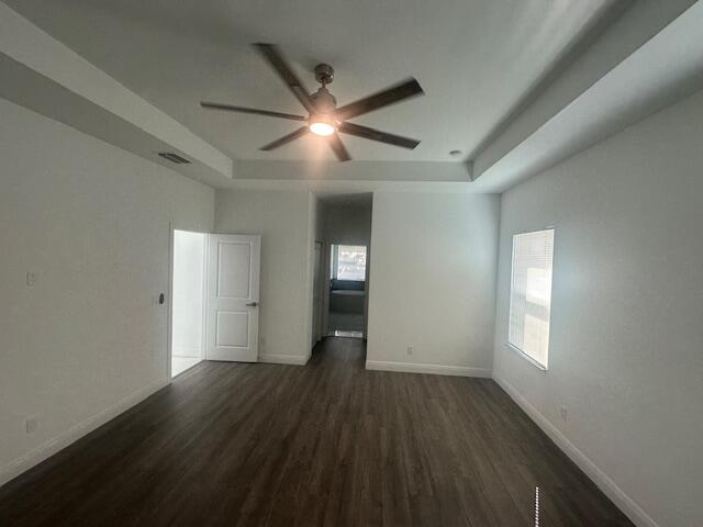 1726 Southwest California Boulevard Port St. Lucie, FL 34953 - Photo 28 of 41 a view of empty room with wooden floor and fan