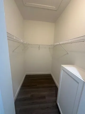 a view of a room with racks on the wall