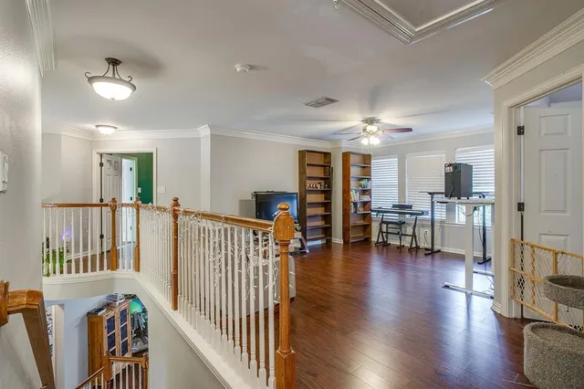 a view of a livingroom with furniture and a window