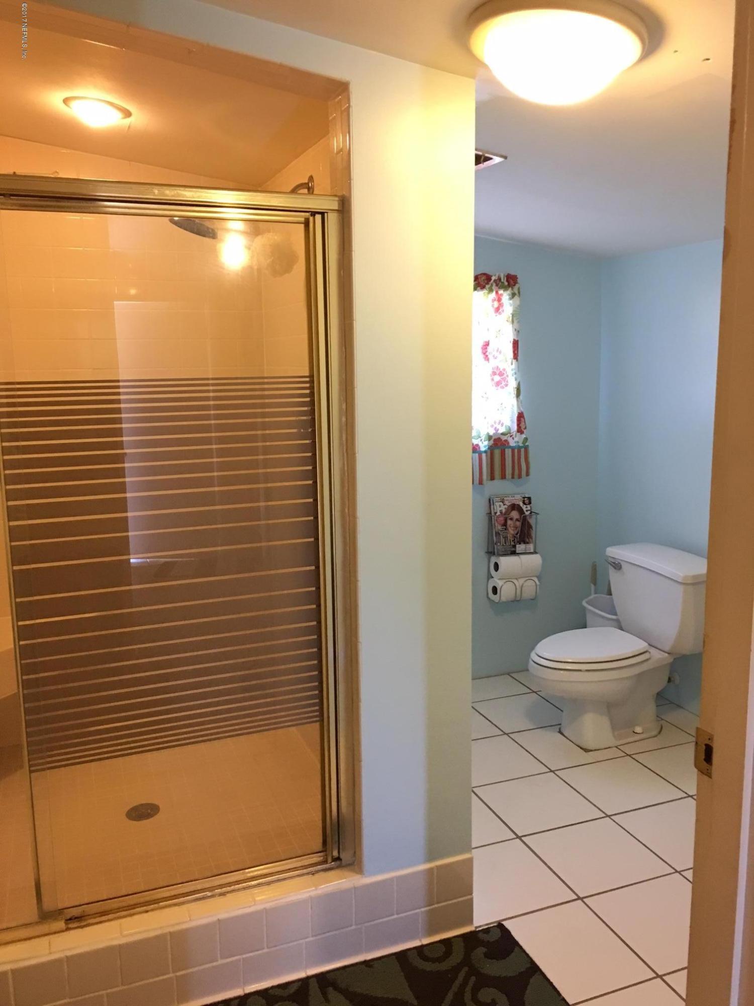 8166 Paschal Street Jacksonville, FL 32220 - Photo 19 of 39 1st Bathroom w/ huge walk in shower