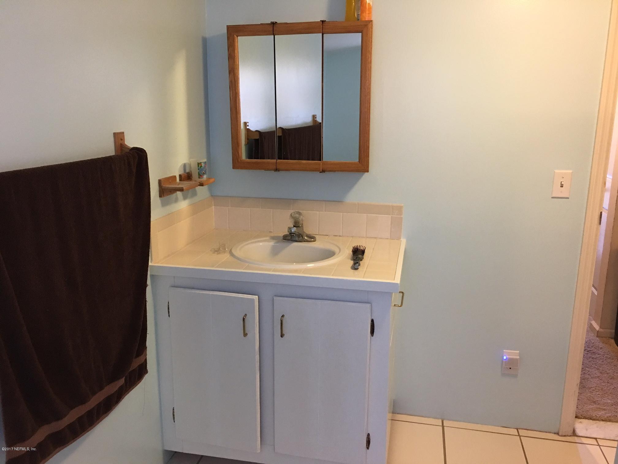 8166 Paschal Street Jacksonville, FL 32220 - Photo 21 of 39 1st Bathroom
