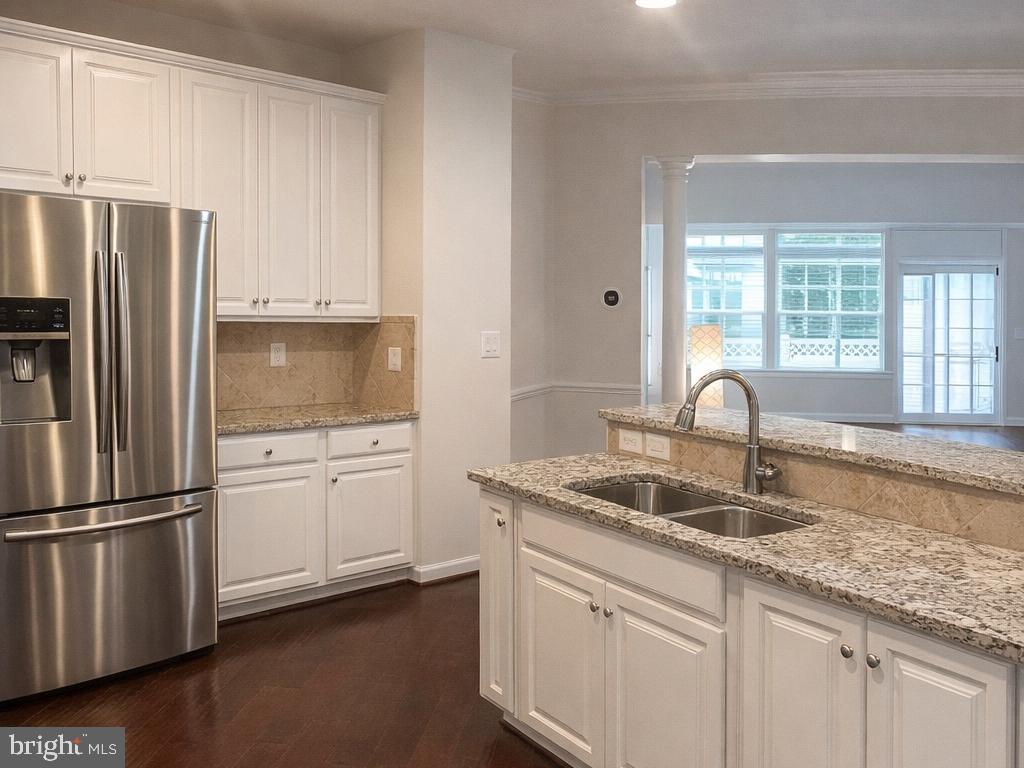 371 Tufton Circle Fallston, MD 21047 - Photo 11 of 47 a kitchen with granite countertop white cabinets and refrigerator