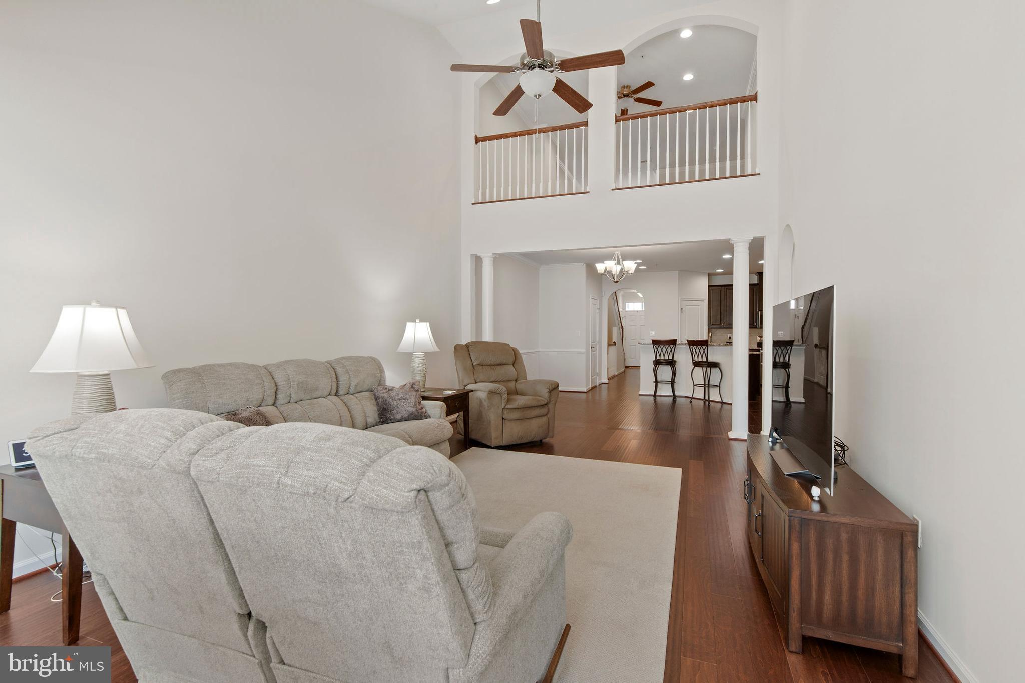 371 Tufton Circle Fallston, MD 21047 - Photo 15 of 47 a living room with furniture a ceiling fan and a rug