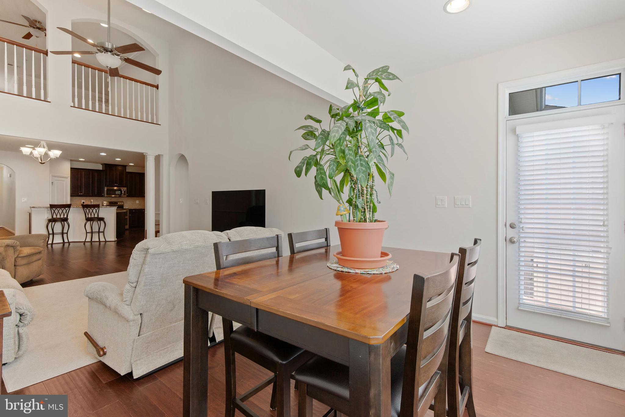 371 Tufton Circle Fallston, MD 21047 - Photo 17 of 47 a view of a dining room with furniture and wooden floor