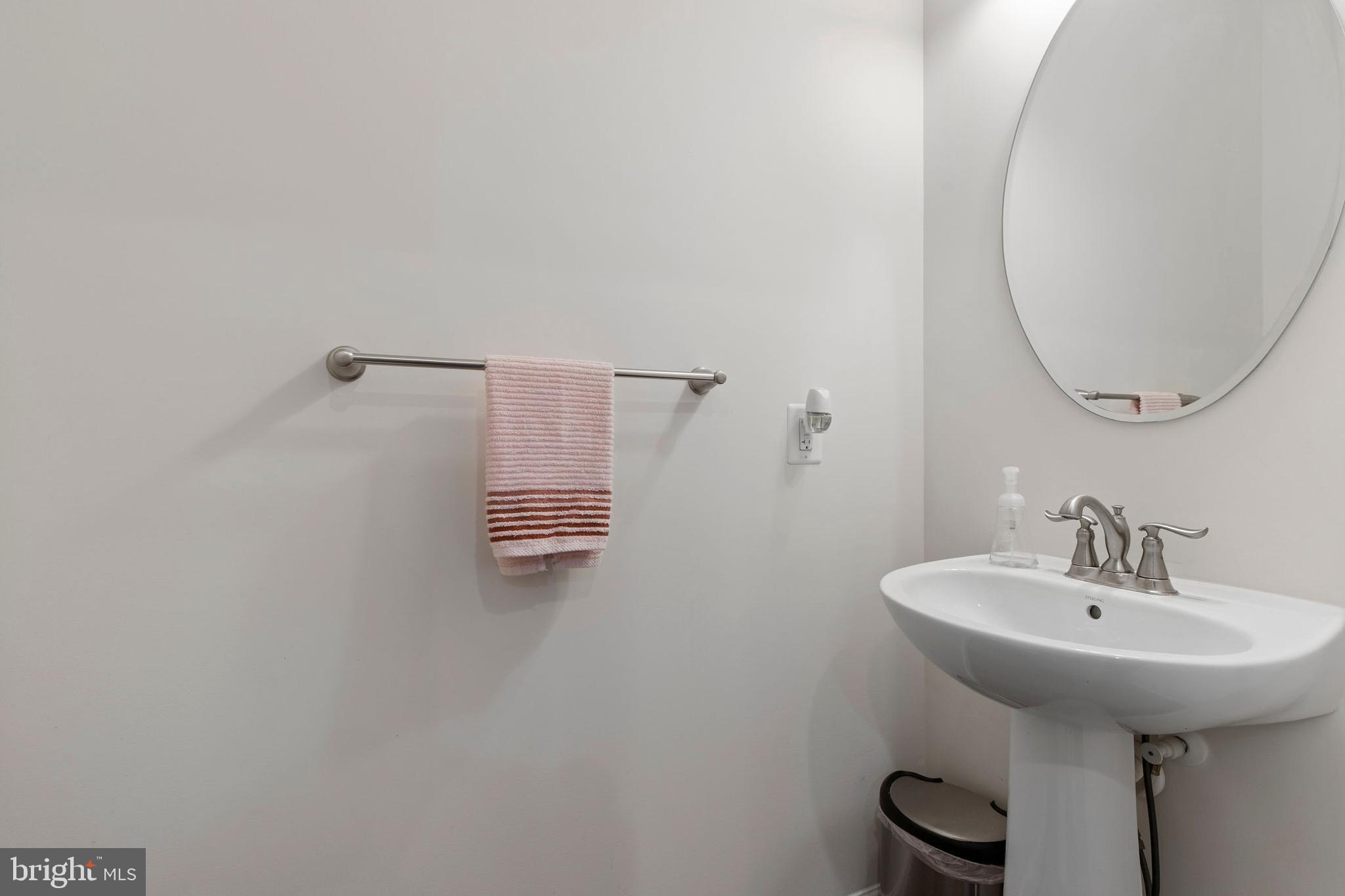 371 Tufton Circle Fallston, MD 21047 - Photo 18 of 47 a bathroom with a sink a mirror and a window