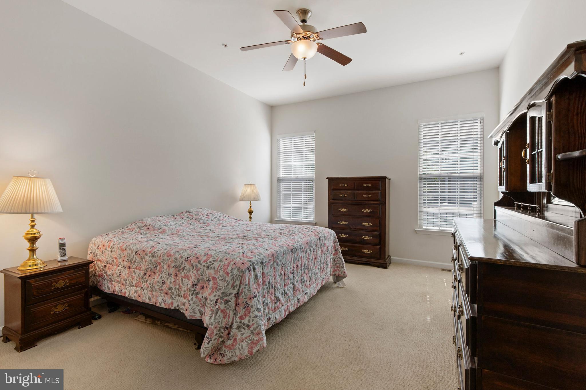 371 Tufton Circle Fallston, MD 21047 - Photo 20 of 47 a bedroom with a bed a dresser and a flat tv screen