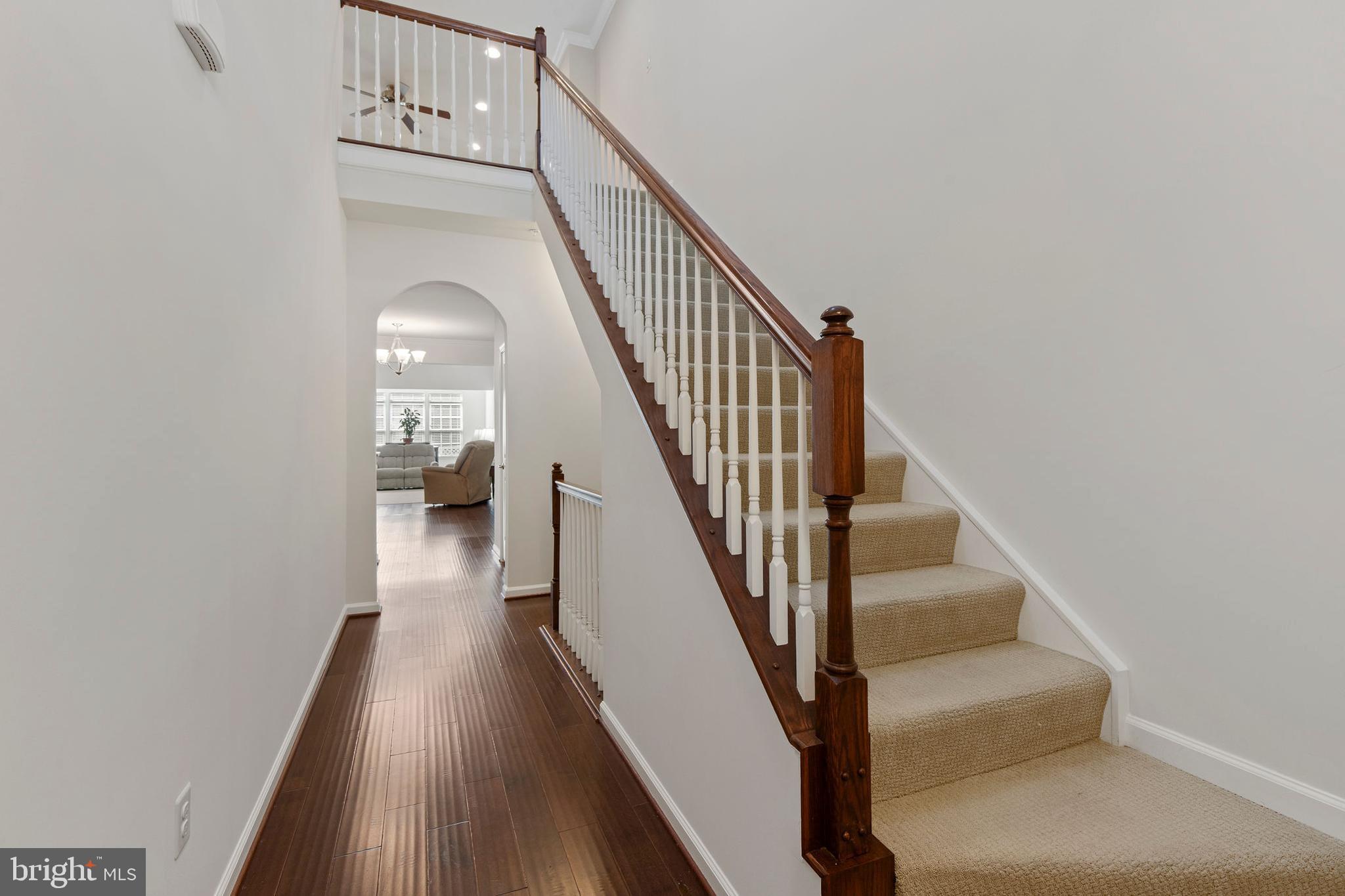 371 Tufton Circle Fallston, MD 21047 - Photo 2 of 47 a view of staircase with wooden floor and white walls