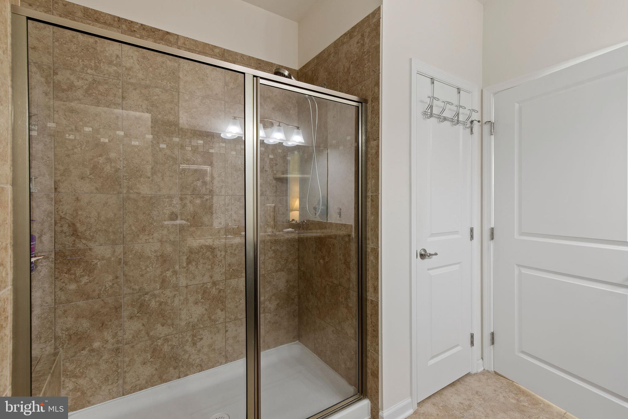 371 Tufton Circle Fallston, MD 21047 - Photo 23 of 47 a bathroom with a glass shower door
