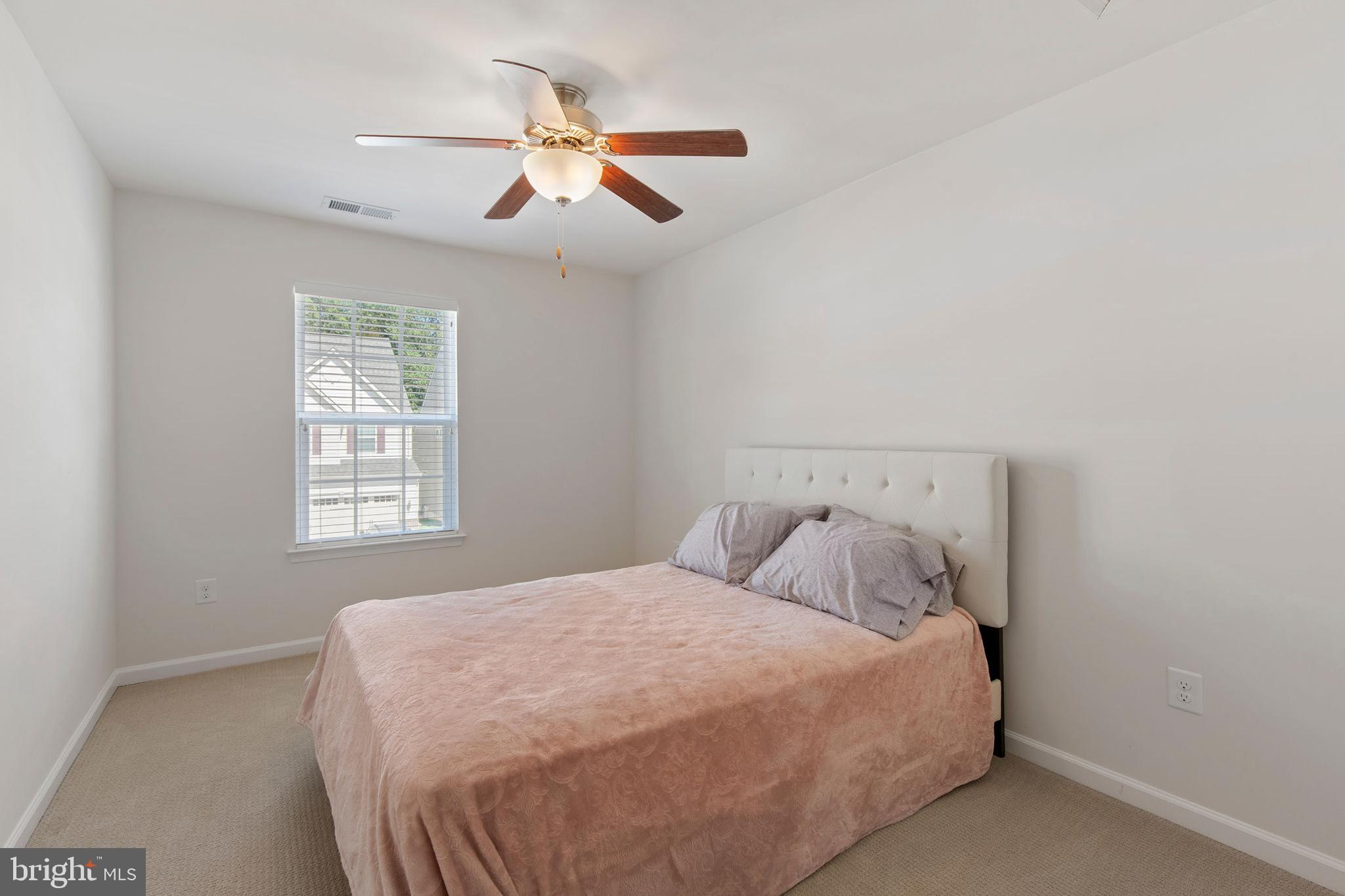 371 Tufton Circle Fallston, MD 21047 - Photo 30 of 47 a bedroom with a bed and a window