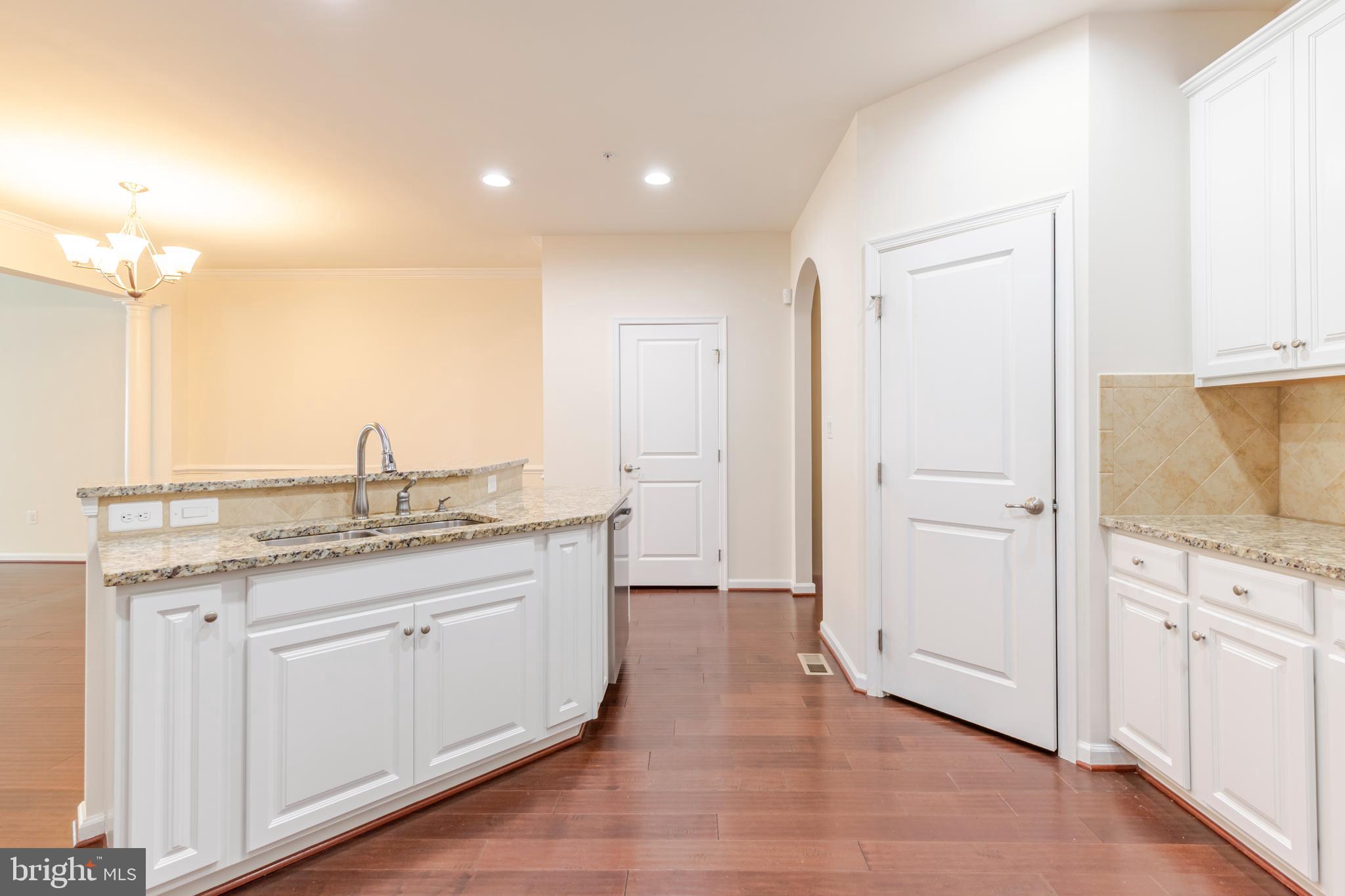 371 Tufton Circle Fallston, MD 21047 - Photo 8 of 47 a bathroom with a granite countertop sink and a mirror