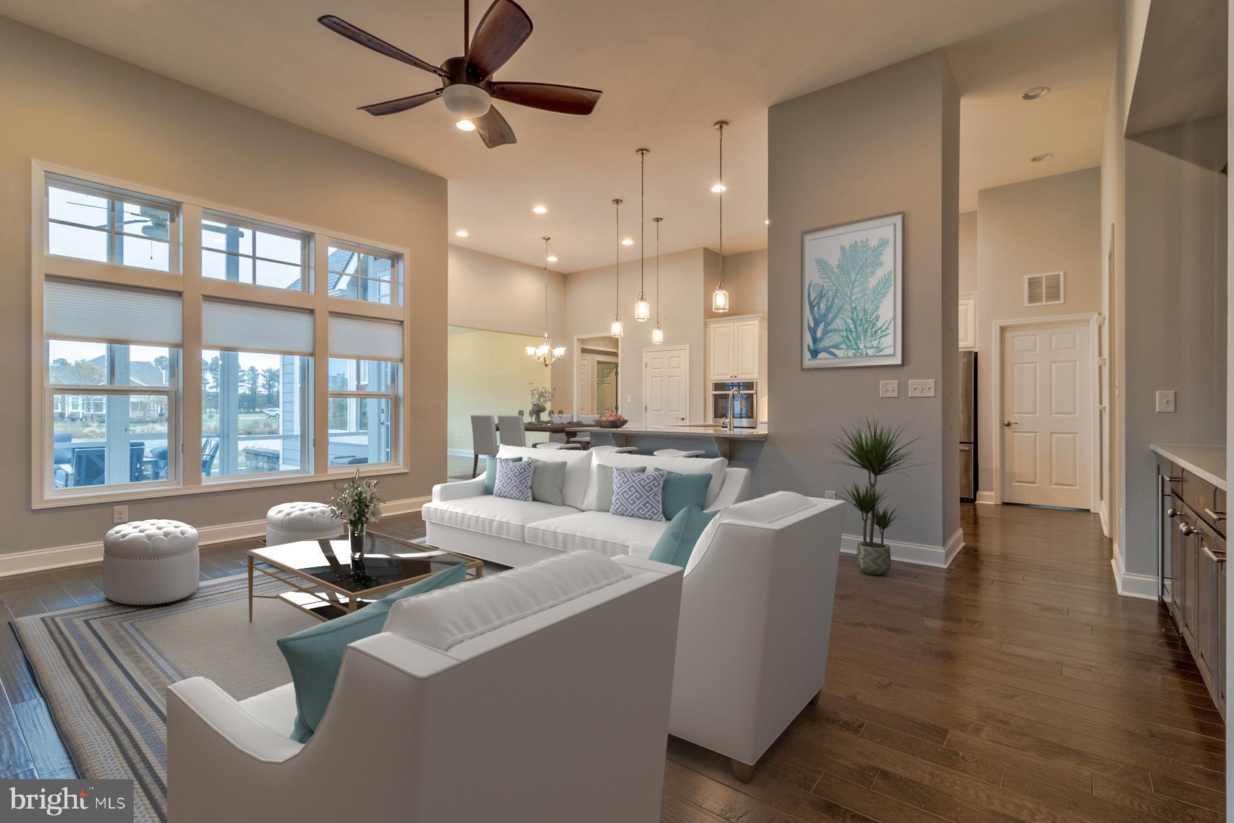 36885 Crossrail Way Lewes, DE 19958 - Photo 13 of 70 a living room with furniture and a large window